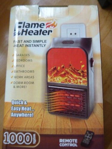 Mini Flame Plug In Wall Outlet Heater photo review