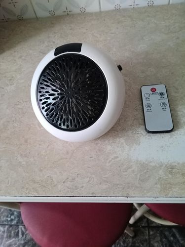 Winterblast - Remote Control Plug In Wall-Outlet Portable Heater photo review